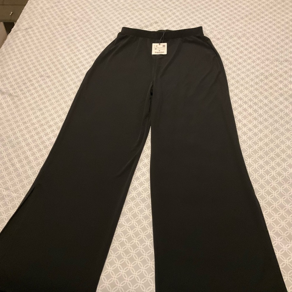 NWT casual or dress- black flowy pants with slits on bottoms